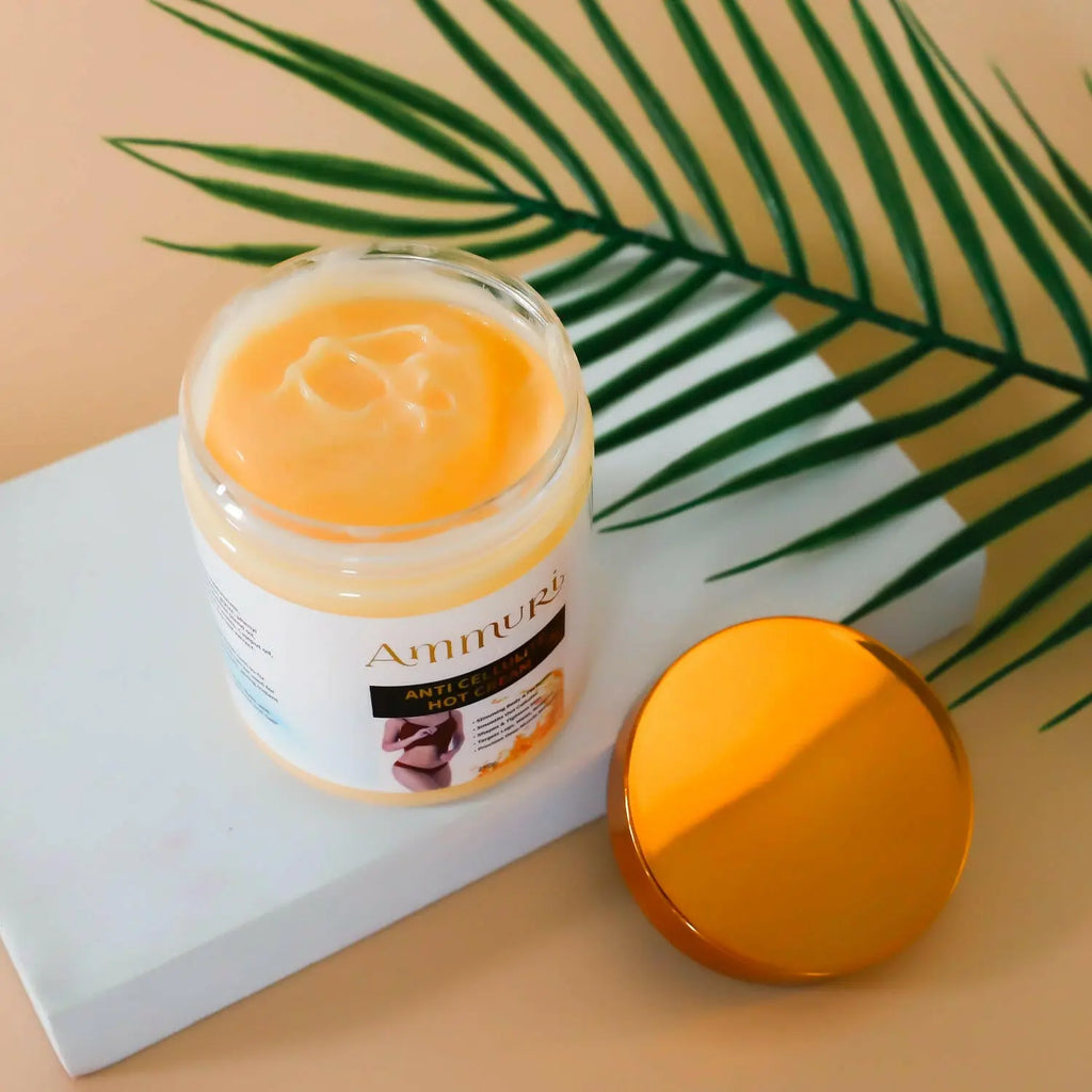 Ammuri Skincare anti-cellulite hot cream in a jar with a golden lid, perfect for improving skin texture.