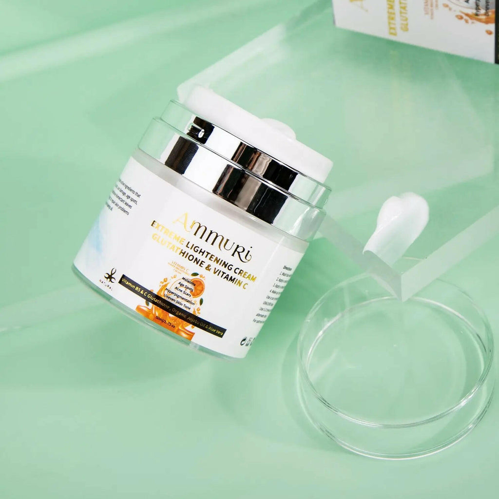 Ammuri Skincare Vitamin C Cream jar for Glutathione skin brightening cream on a green surface