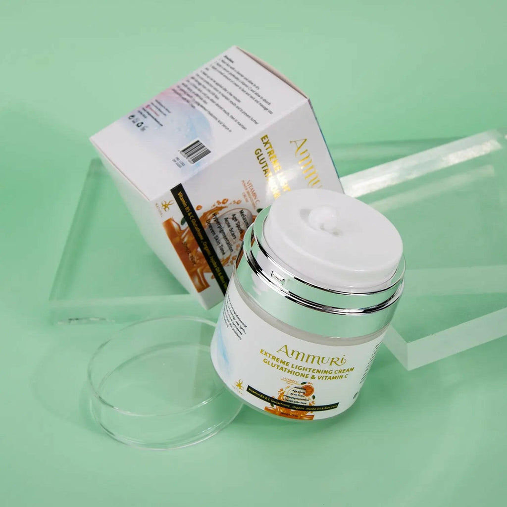 Ammuri Skincare Glutathione skin brightening cream in a jar with a box on a mint green background