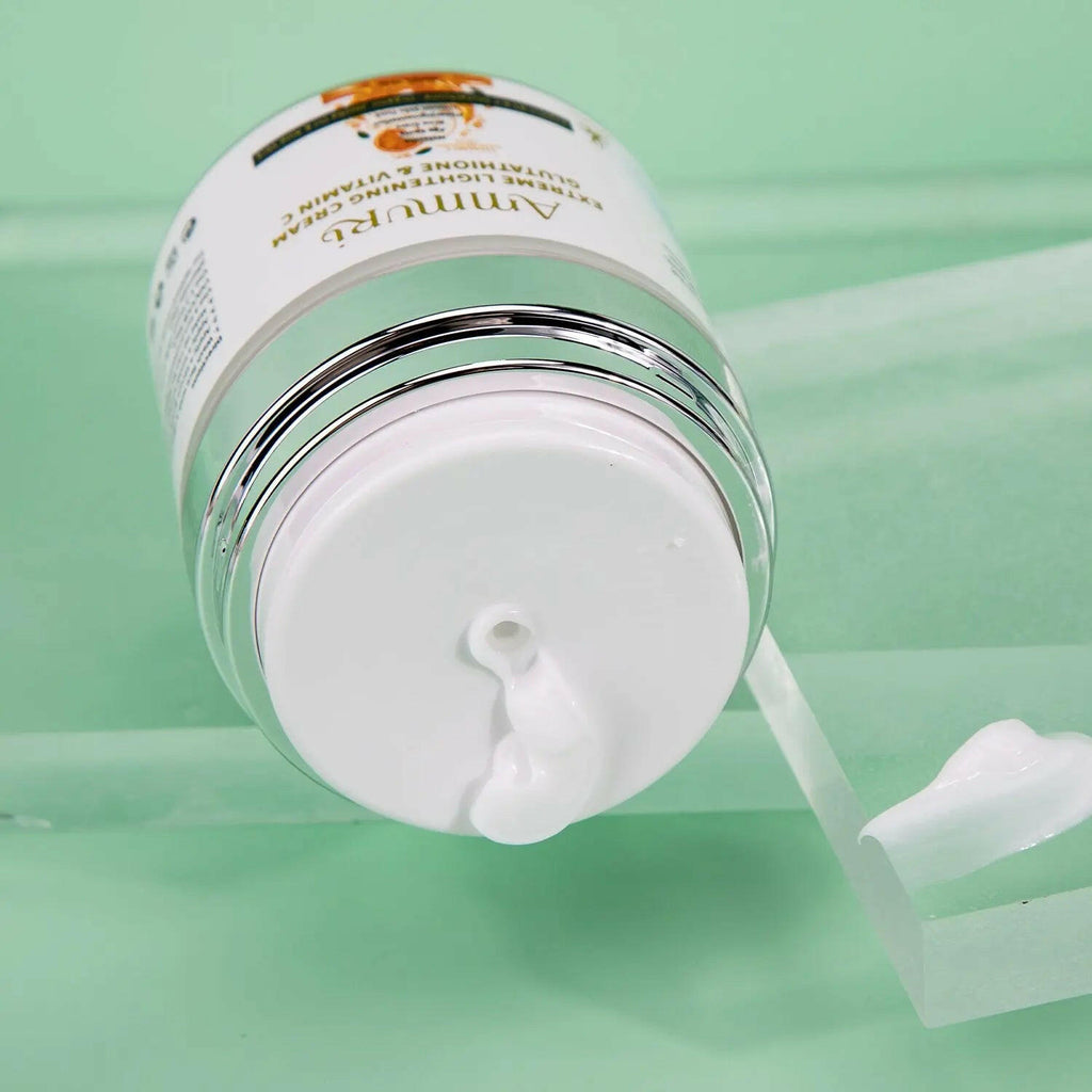 Ammuri Skincare Vitamin C Cream with Glutathione skin brightening cream spilling from jar