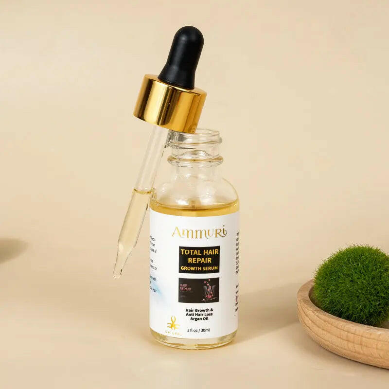 Ammuri Skincare Total Hair Repair Growth Serum, an effective hair loss solution in a glass dropper bottle