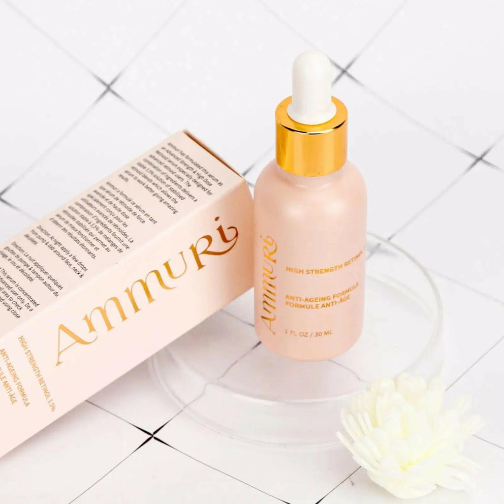 Ammuri high strength retinol serum in a pink bottle with a dropper for anti-ageing skincare.