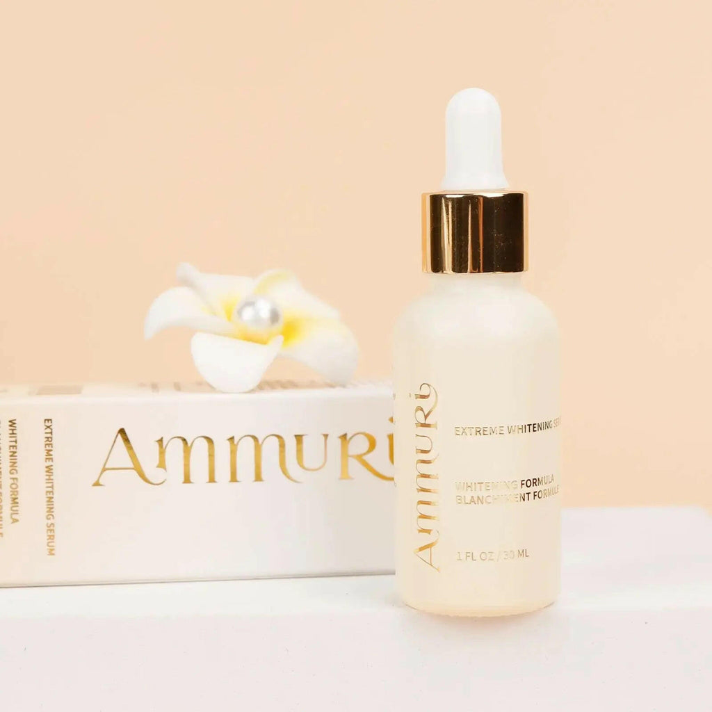 Ammuri Kojic Acid Whitening Serum in a dropper bottle with a luxurious white and gold design