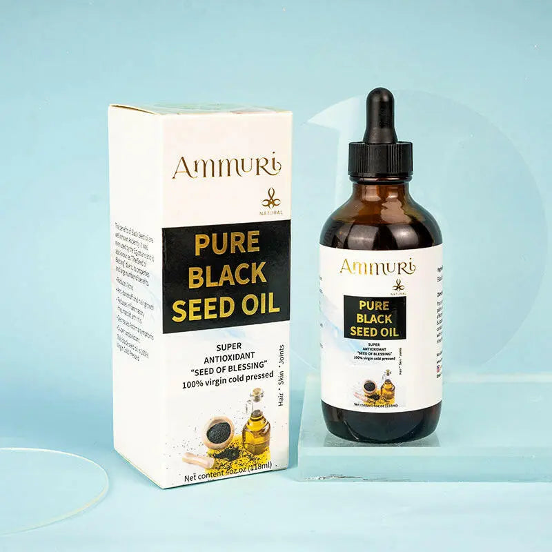 Ammuri Skincare Pure Organic Black Seed Oil in a dropper bottle with a sleek box packaging