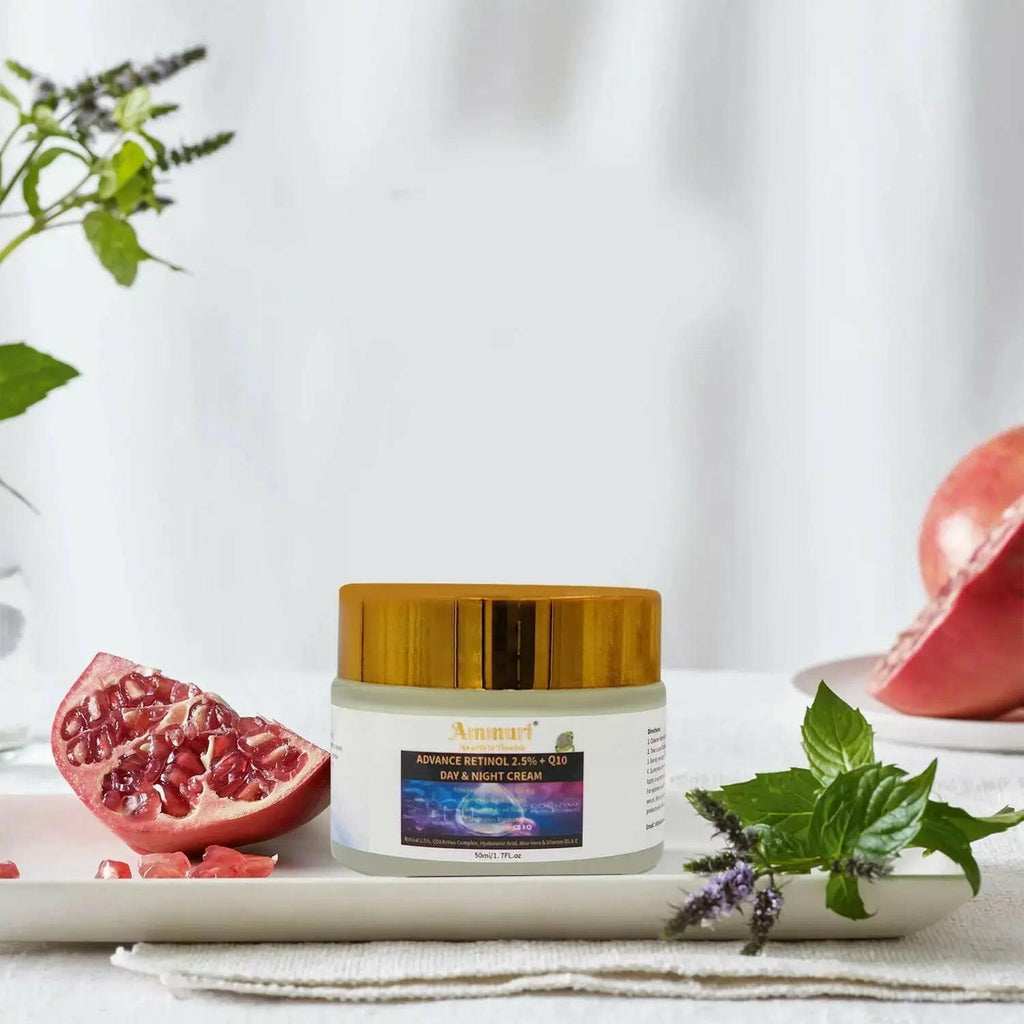 Ammuri Beauty Q10 face cream jar on a decorative dish with pomegranate and mint leaves