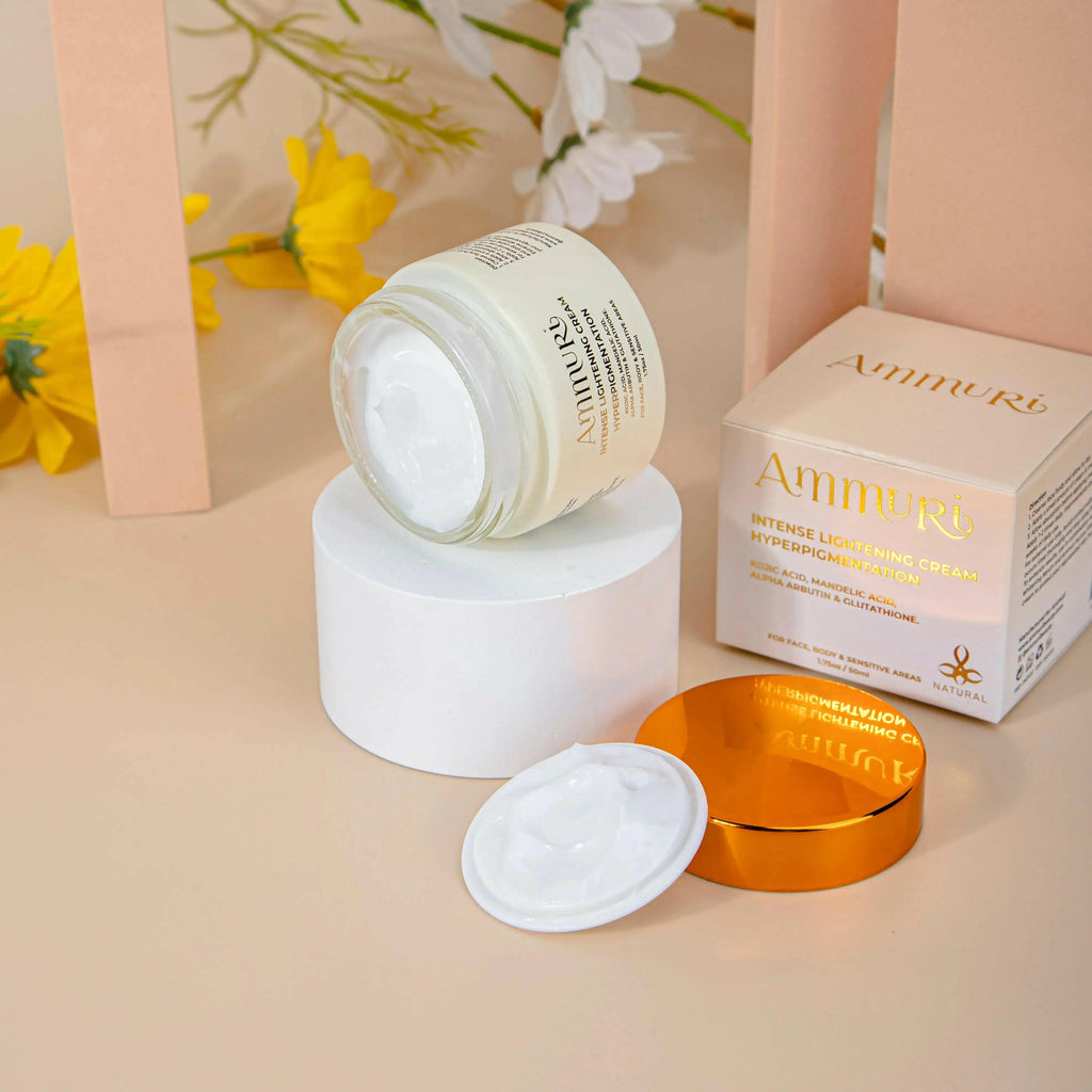 Ammuri Beauty skin lightening cream for dark spots in a jar with an open lid and decorative packaging