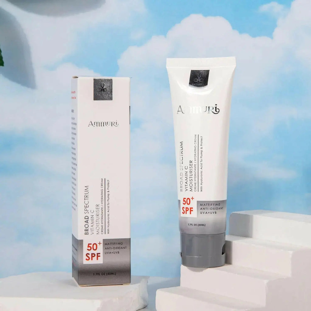 Ammuri Vitamin C Moisturiser SPF 50 anti-aging moisturizer in a sleek tube on a marble surface