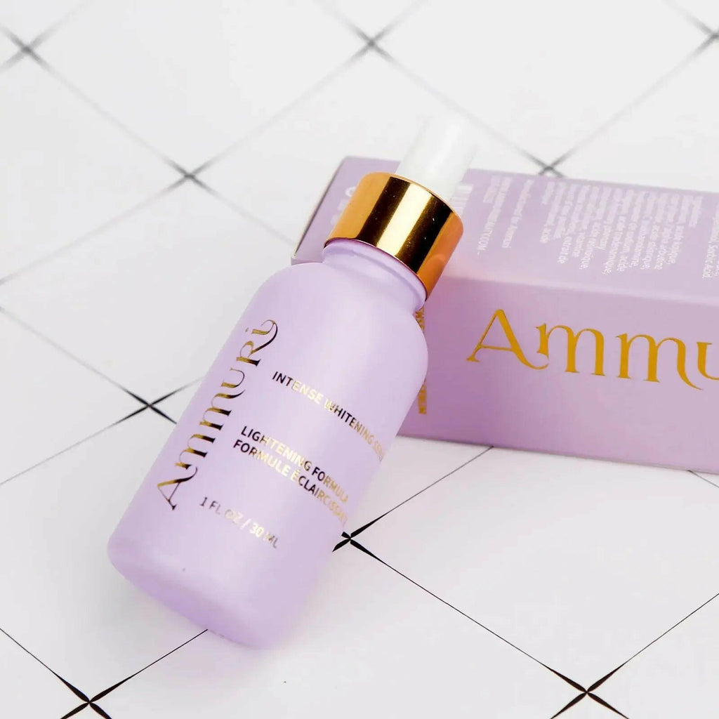 Ammuri Skincare Whitening Lightening Serum in a purple bottle with a gold cap for brighter skin